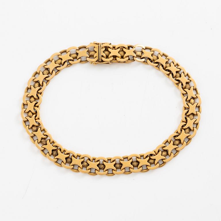 Bracelet. 18K gold, x-link.