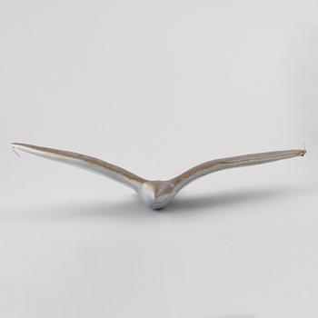 A stoneware sculpture of a sea bird, unsigned.