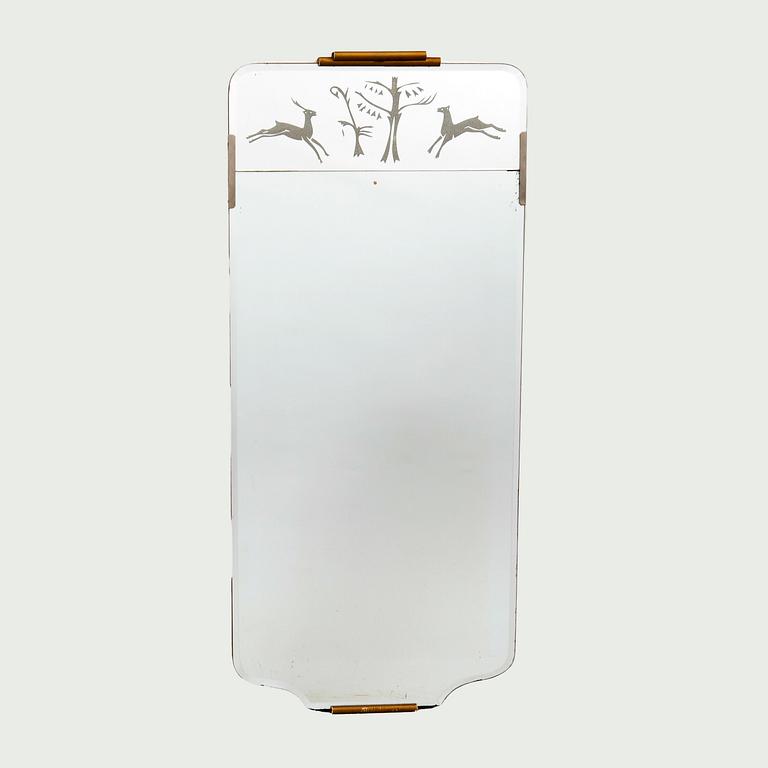 A 1940s Swedish Modern mirror.