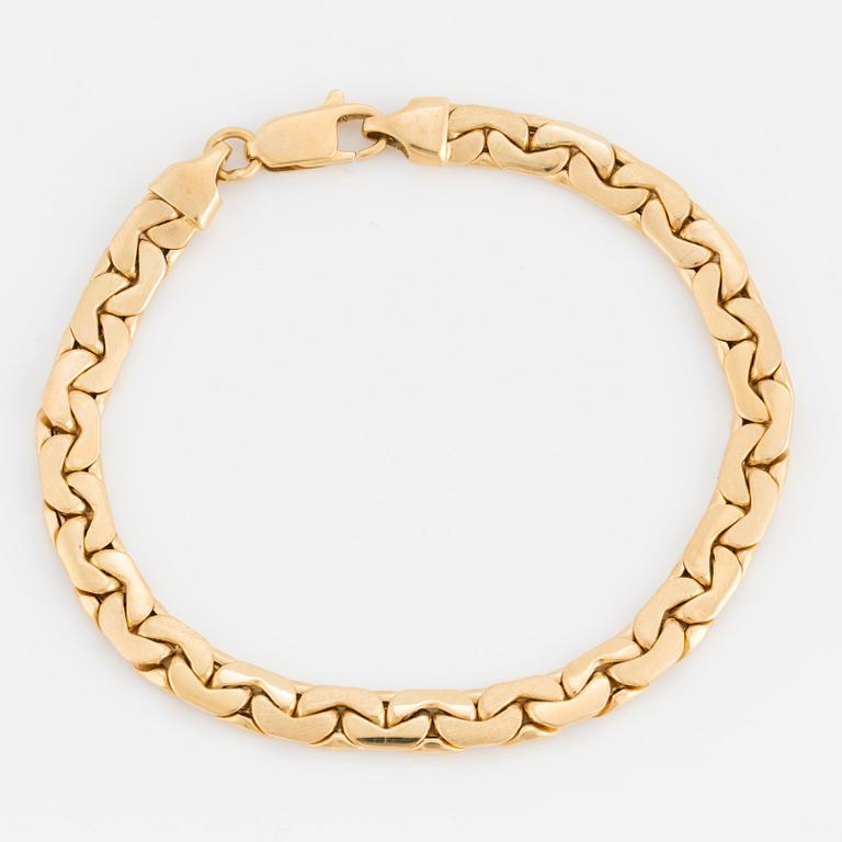 A fancy-link bracelet.