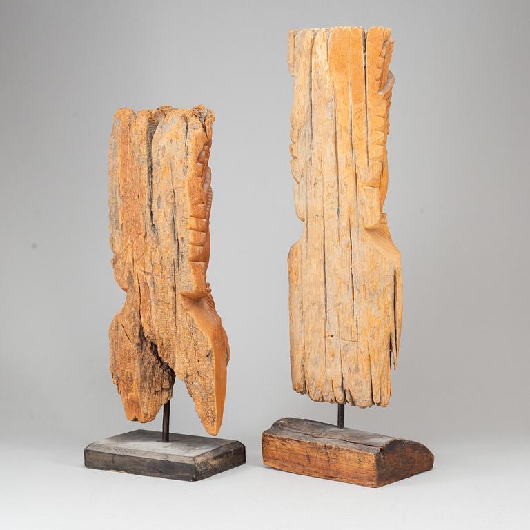 A pair of South East Asian sculptures, 20th Century.