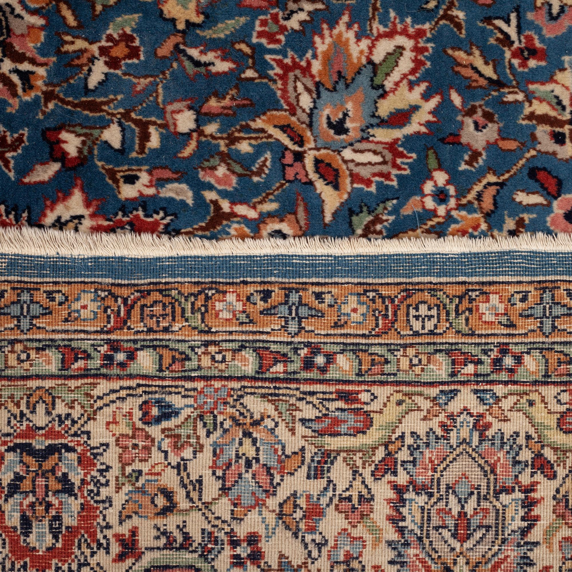 A carpet semi-antique/old oriental, ca 346 x 246 cm.