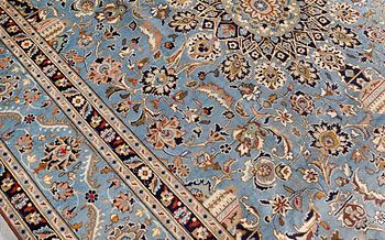 A Kashmar carpet, approximately 343 x 240 cm.