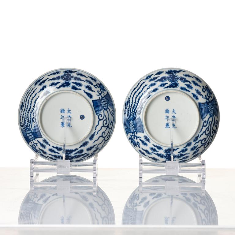 A pair of blue and white 'Phoenix dishes', Qing dynasty with Guangxu six character mark and of the period (1875-1908).