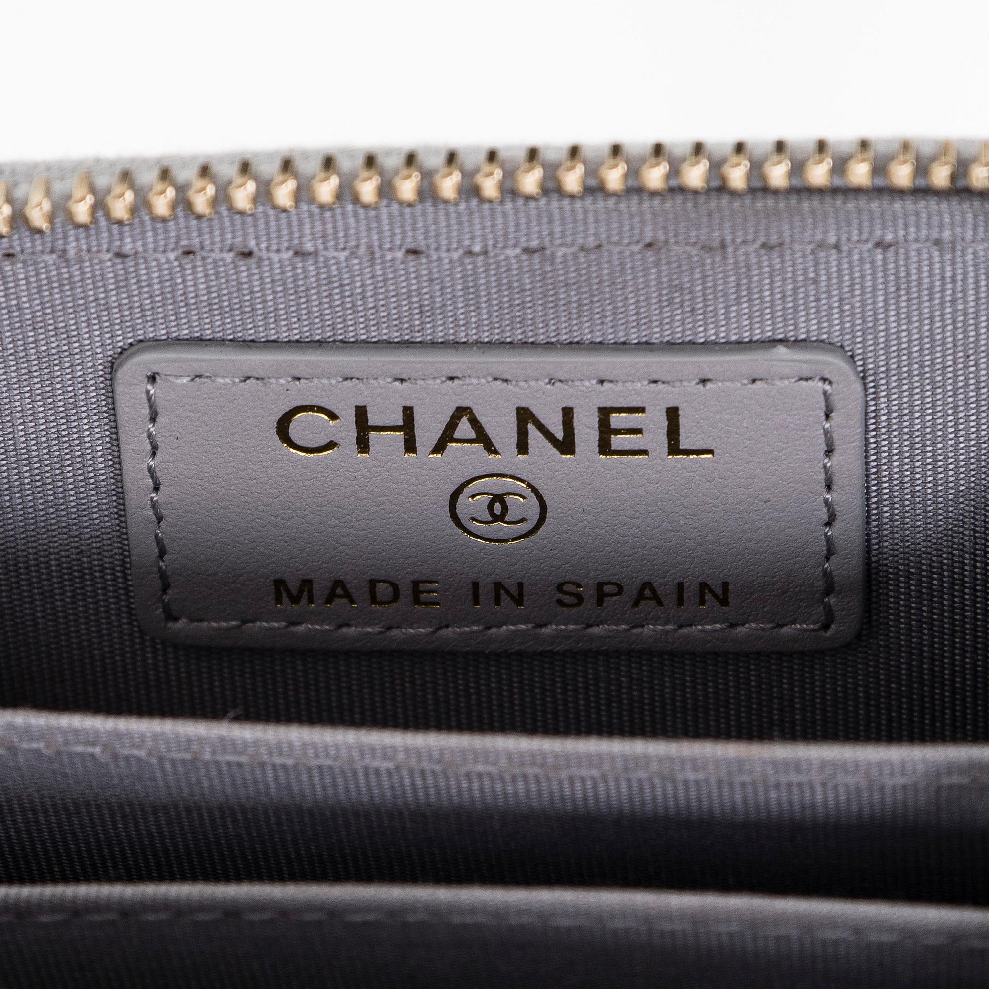 Chanel, A "19 O-coin purse" wallet.
