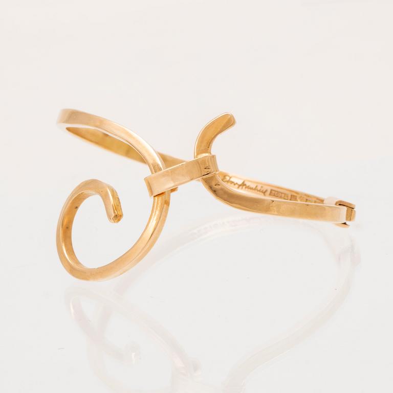 An 18K gold bracelet by Elon Arenhill, Malmö 1963.