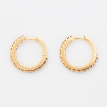 A pair of Ole Lynggaard earrings "Love" in 18K gold set with round brilliant-cut diamonds.
