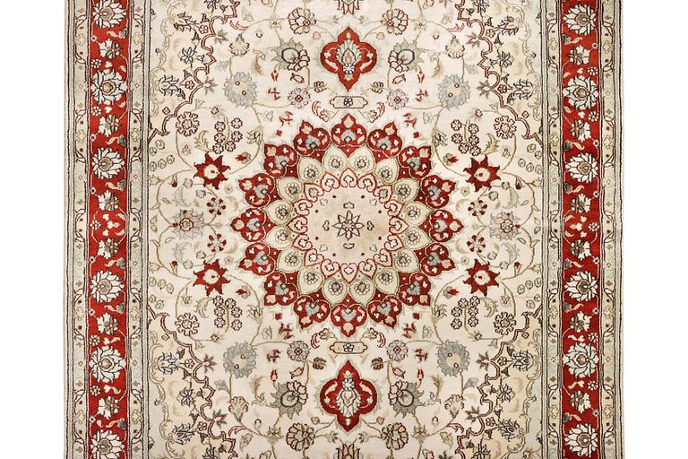 A carpet, Turkey, silk, c. 180 x 120 cm.