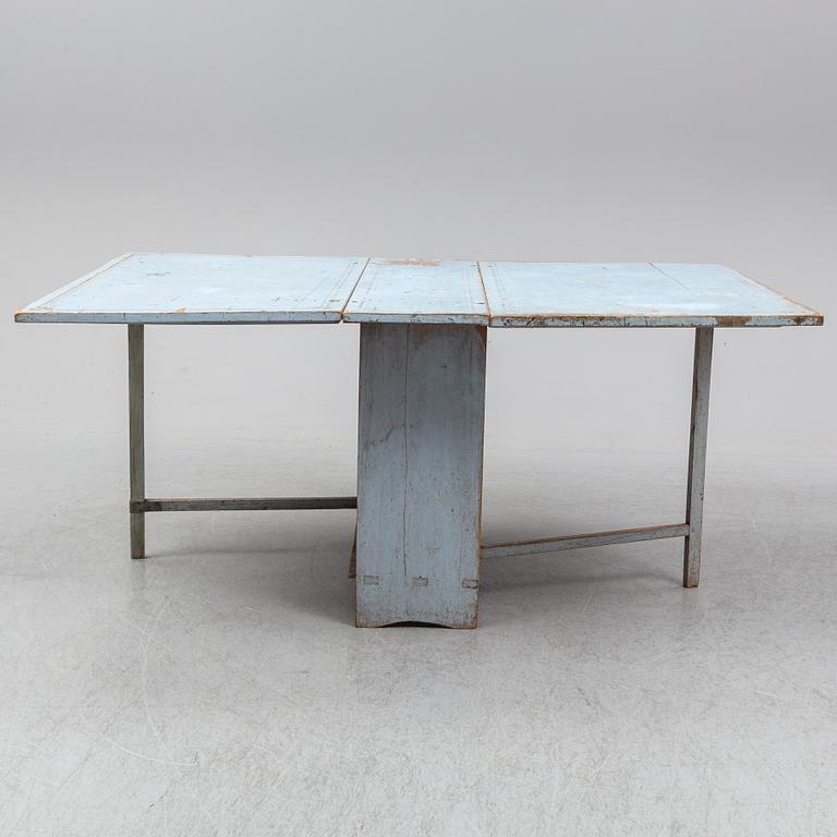 A 18th Century painted gate leg table.