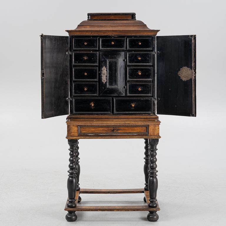 A Baroque cabinet, 18th Century.