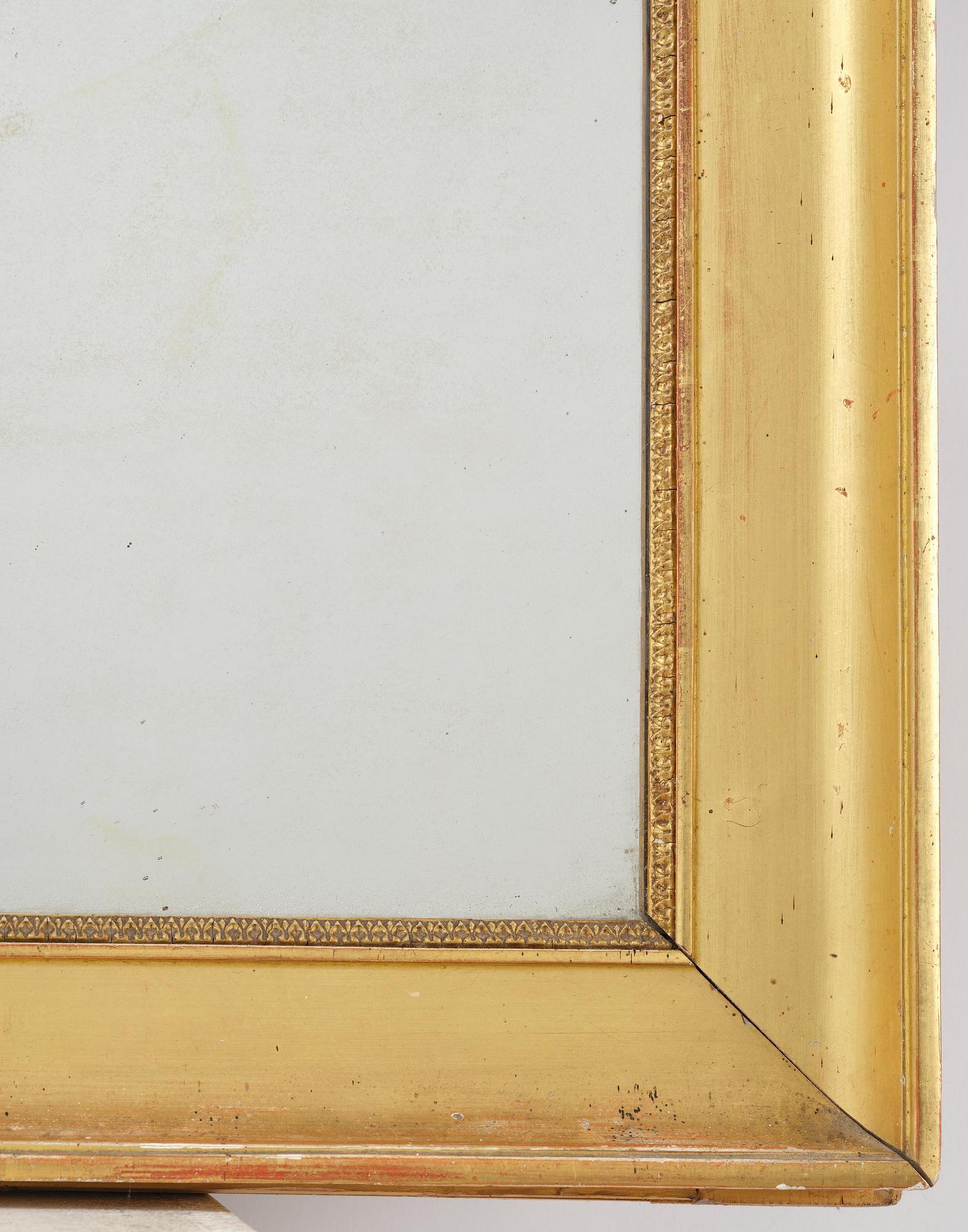 A Swedish giltwood Empire mirror, first part 19th century.