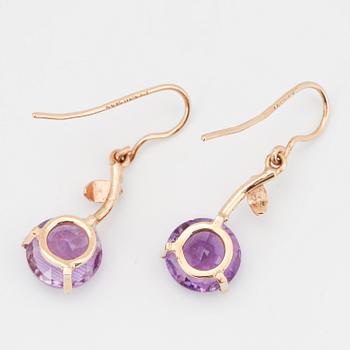 Round faceted amethyst and diamond earrings.
