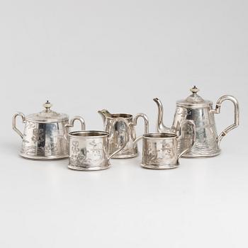 A five-piece Russian parcel-gilt tea set, maker's mark B.A. for Vasili Andrejev or Vasili Akimov, Moscow, 1898-1914.