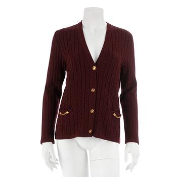 765. CÉLINE, a burgundy red wool cardigan. Size 44.