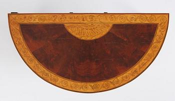 A Russian Louis XVI mahogany and birch parquetry demi-lune games table, late 18th century.