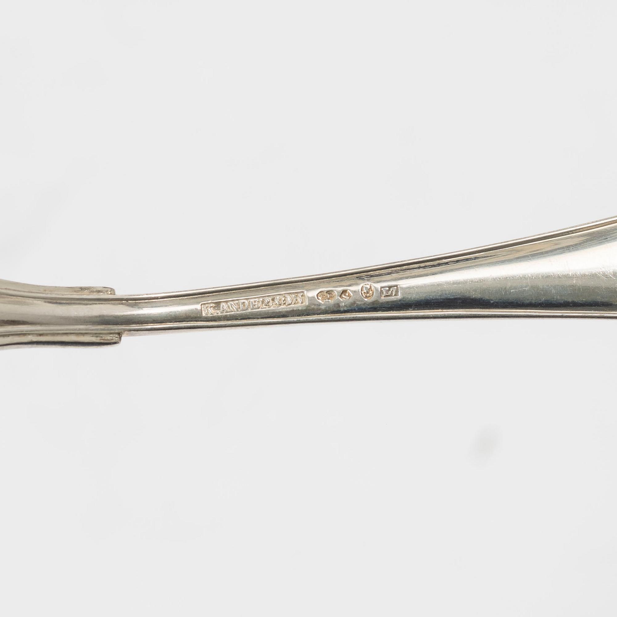 Karl Anderson, fiskbestick, 24 st, silver, modell "Svensk spetsig", Stockholm 1912-13.