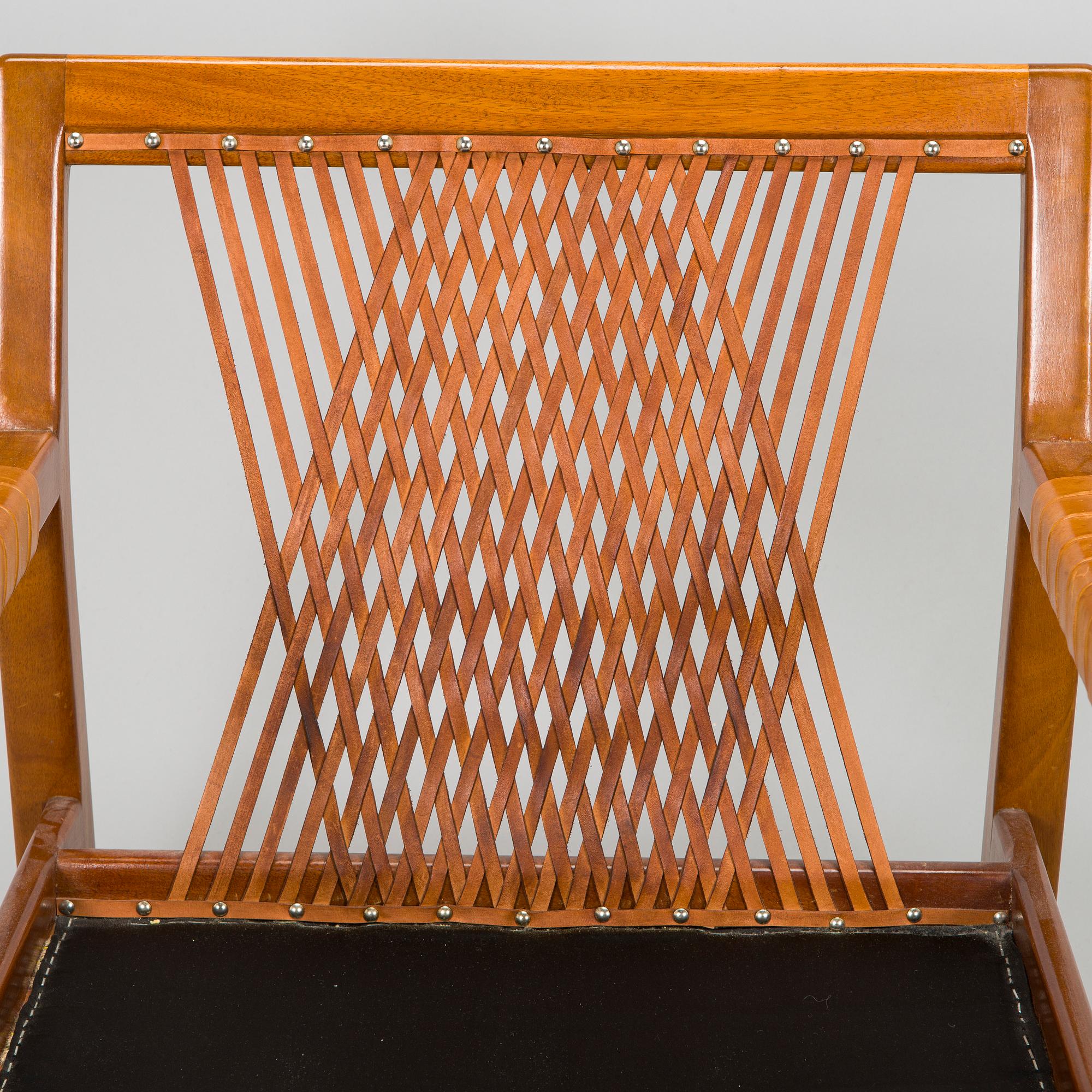 Carl Gustaf Hiort af Ornäs, a pair of late 1950s 'Rialto' open armchairs, Puunveisto Oy - Träsnideri Ab, Finland.