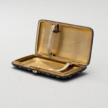 A CIGARETTCASE, silver and enamel, St:Petersburg ca 1900, makers mark N.L.