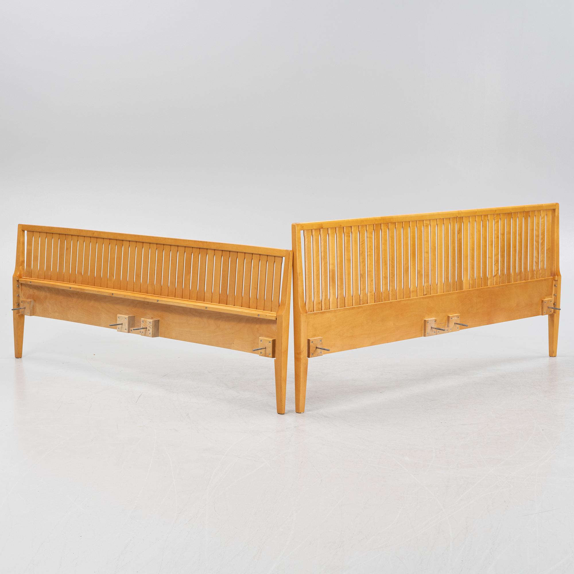 An 'Ulrika' birch headboard and foot end, by Carl Malmsten for Åfors, second half of the 20th Century.