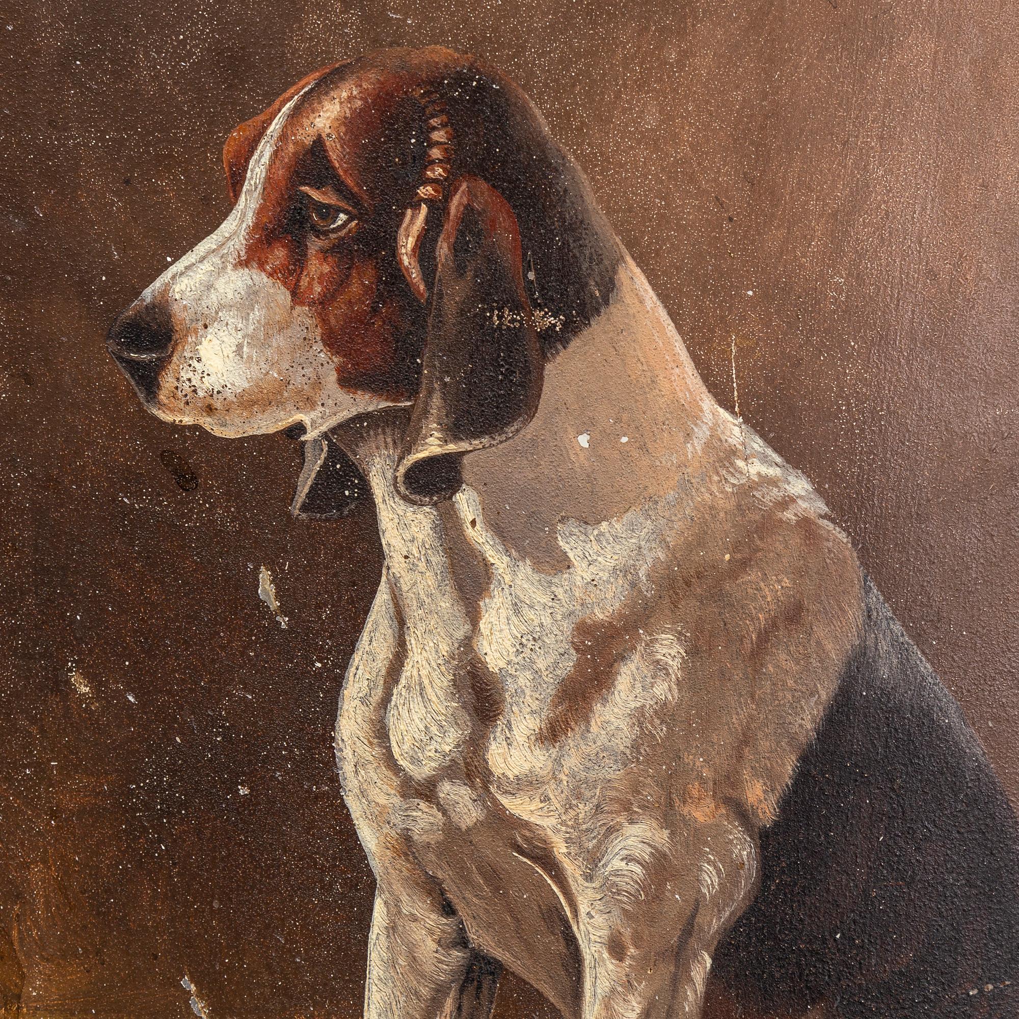 A 19th century brass fire shield decorated with paint of hunting dog setter in the stable.