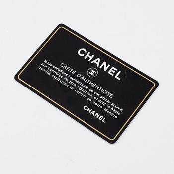 Chanel, a quilted silver leather wallet, 2006-08.