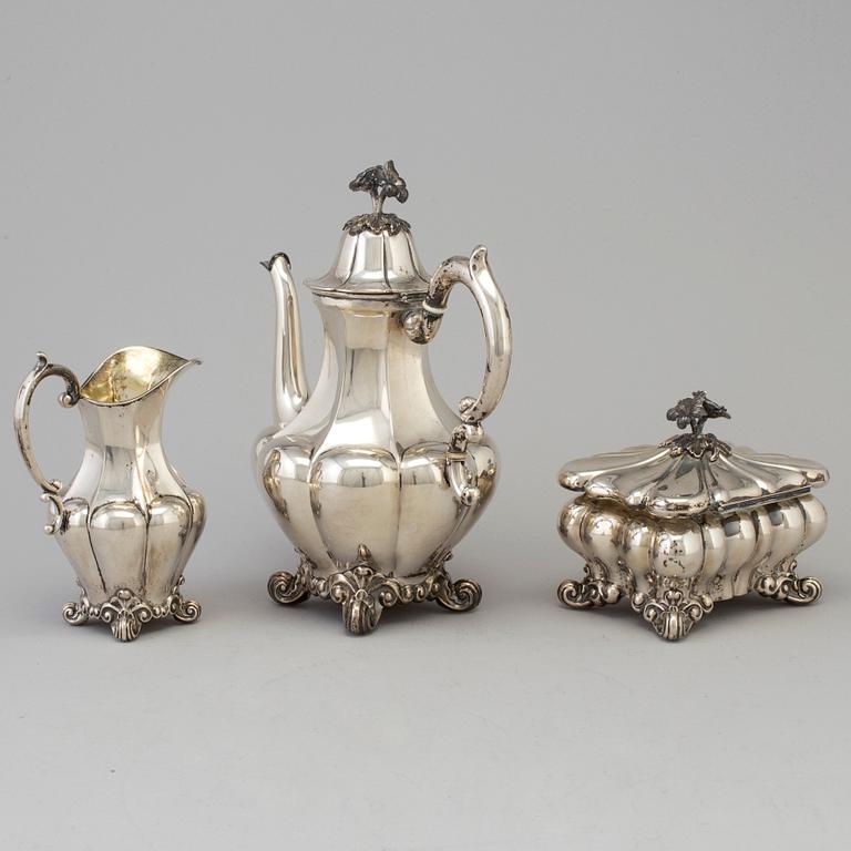 A three-piece coffee service, parcel-gilt and silver. Maker's mark CG Hallberg, Stockholm, 1925.