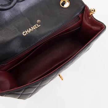 CHANEL Vintage Single Half Moon Flap Bag, 1986-88.