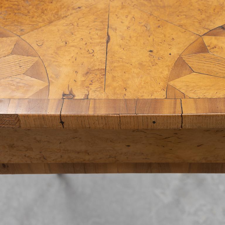 An inlay table, 19th Century.