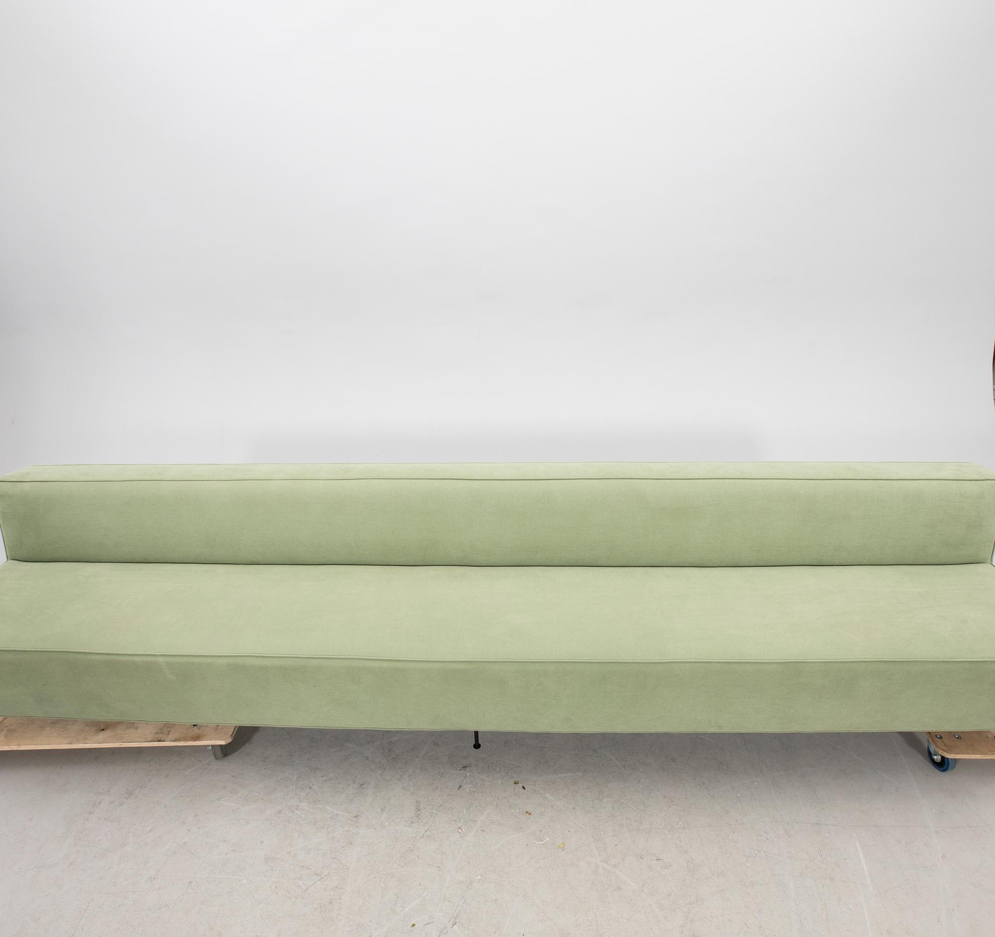 A sofa Modern Line' by Greta Magnusson Grossman, produced by Gubi, contemporary.