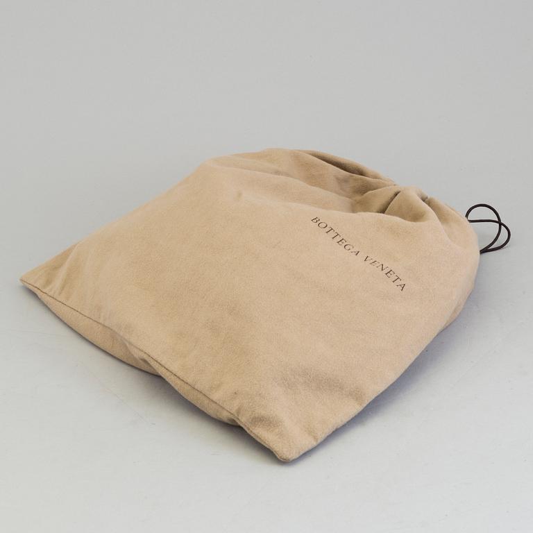 A bag by Bottega Veneta.