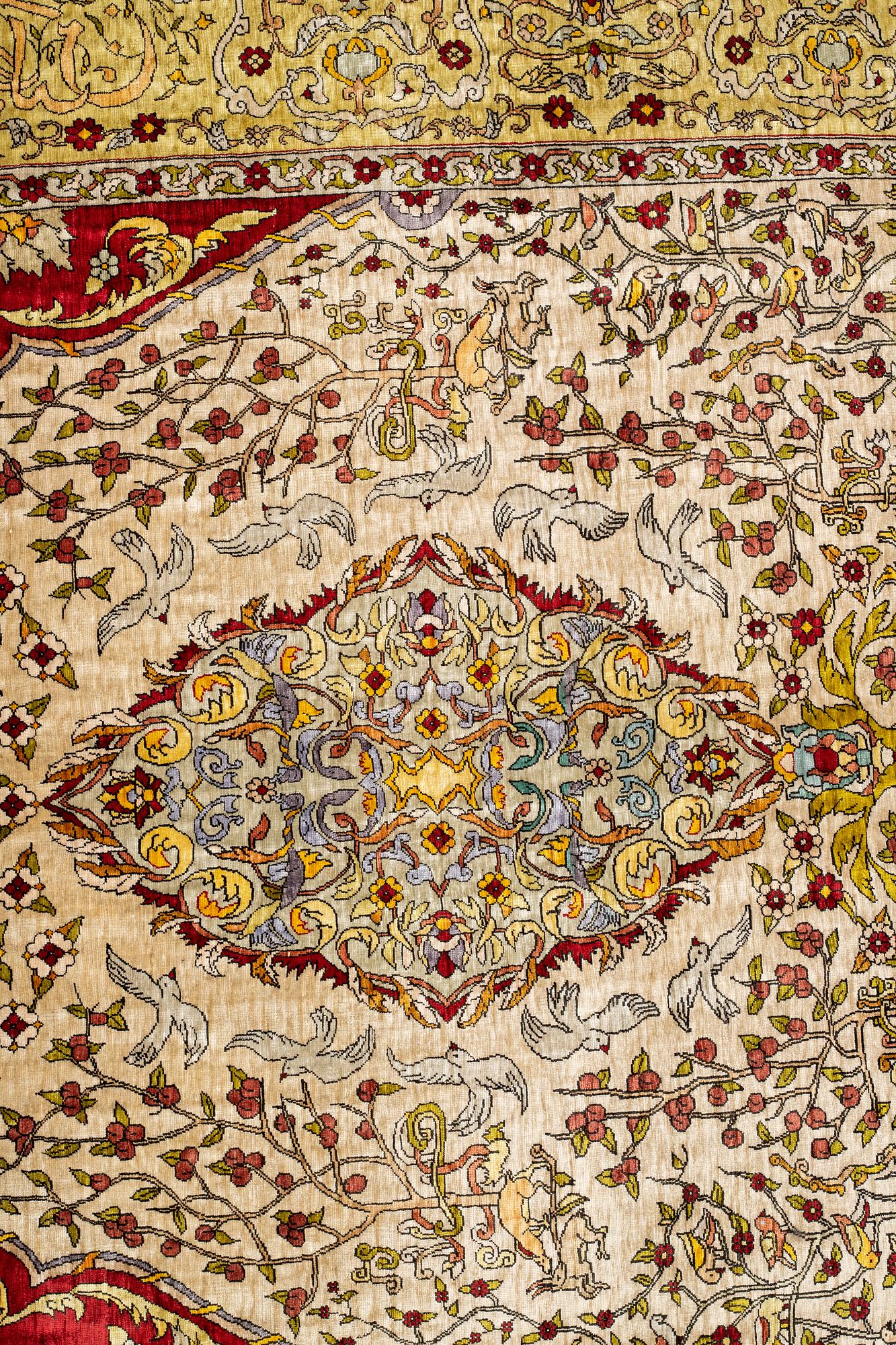 A rug, Old silk Hereke, ca 178 x 119 cm.