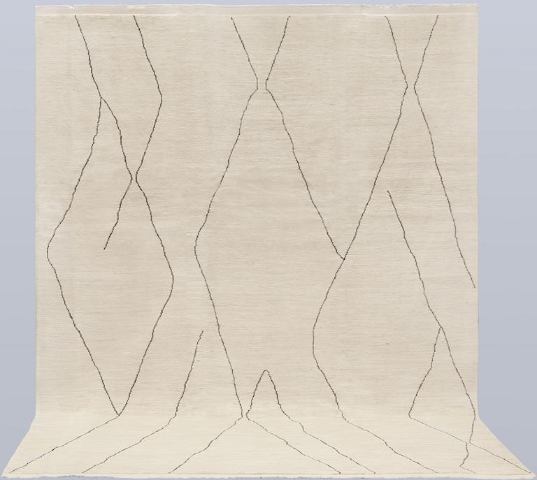 A Moroccan carpet, 335 x 258 cm.