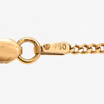 A 14K gold neckalce with glass pearls.