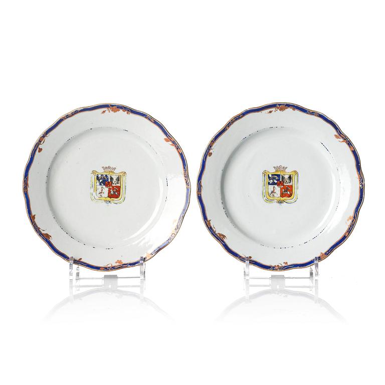 A pair of 'Chinese Export' armorial dinner plates, Qing dynasty, 1790's.