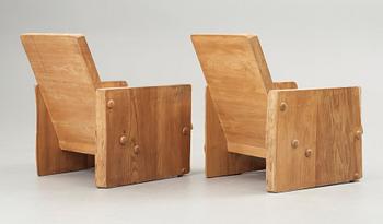 A pair of Swedish mid 20th Century armchairs, reportedly by architect Uno Liljeqvist, cabinetmaker Fritjof Nilsson.