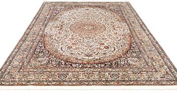 A silk Kashmir carpet, approx. 300 x 200 cm.