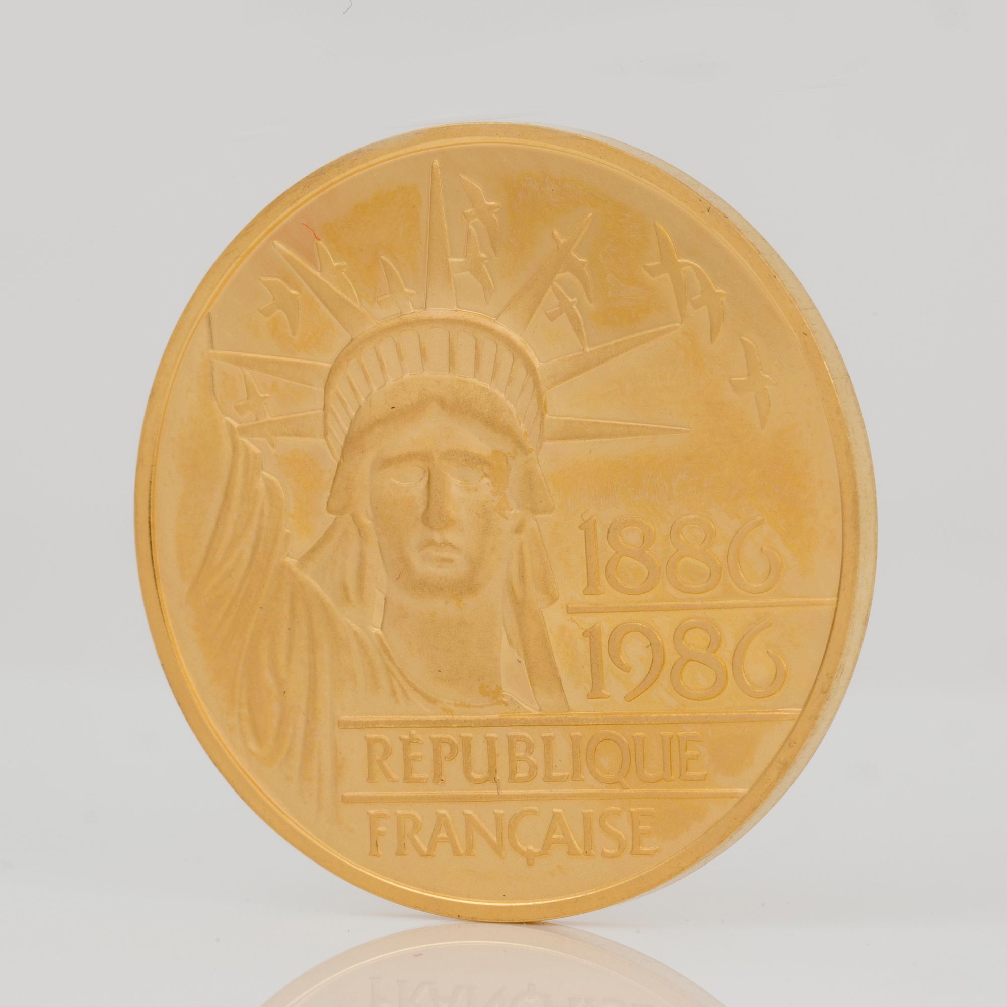 GULDMYNT. 100 Francs, 1986. Vikt ca 17 g.
