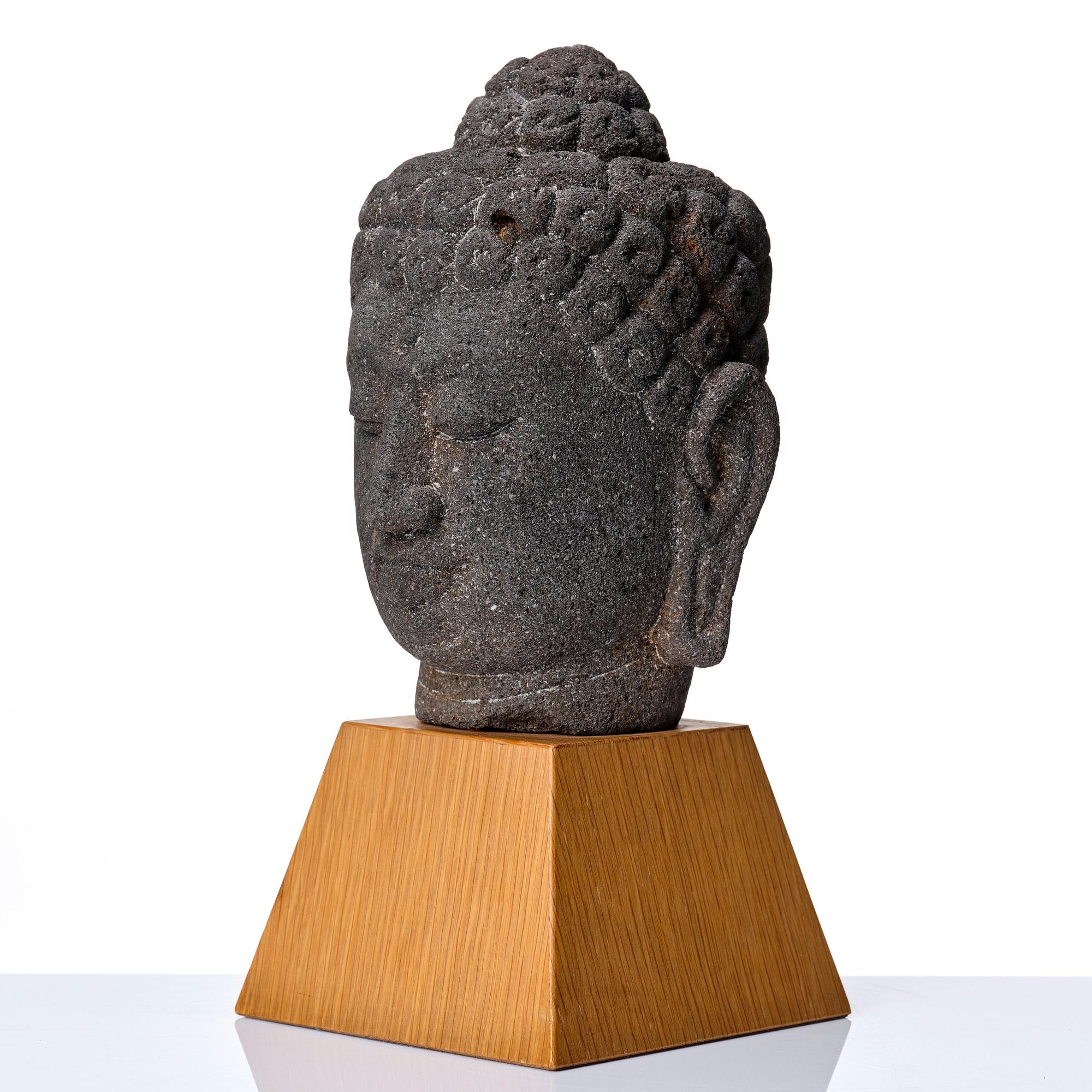 A Borobodur style Head of Buddha, Java.