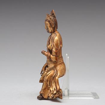 A lacquered wooden figure of Guanyin, 17th/18th Century.