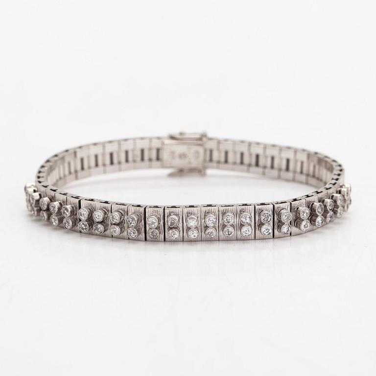 An 18K white gold bracelet, with round brilliant-cut diamonds totalling approximately 1.44 ct. Swedish import stamp.