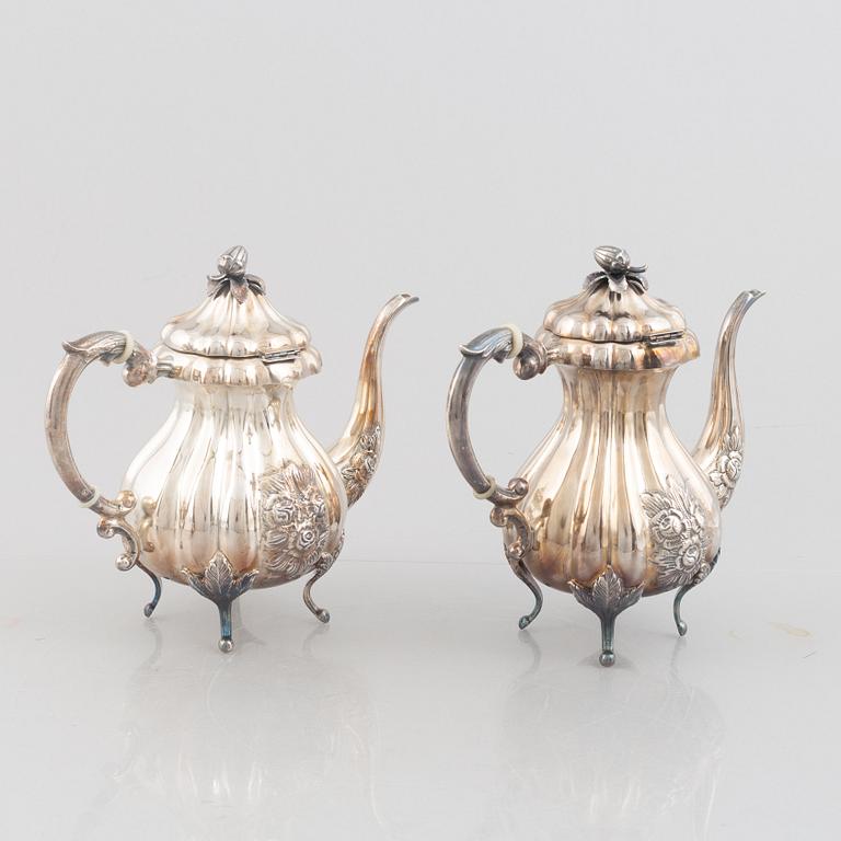 An Austrian silver coffee pot, tea pot, cream jug and sugar bowl, Vienna 1826.