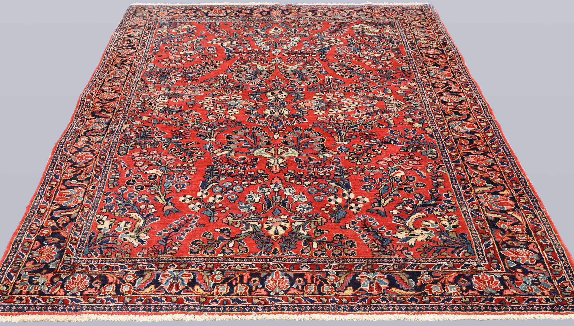 An American Sarouk rug, semi-antique, c. 200 x 142 cm.