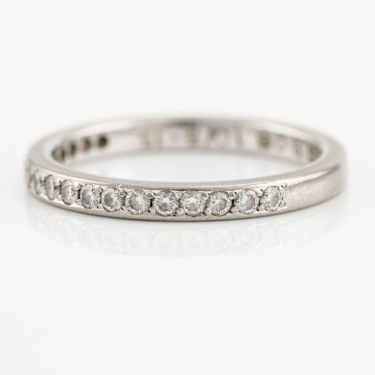 Ring, half eternity, 18K white gold with small brilliant-cut diamonds.