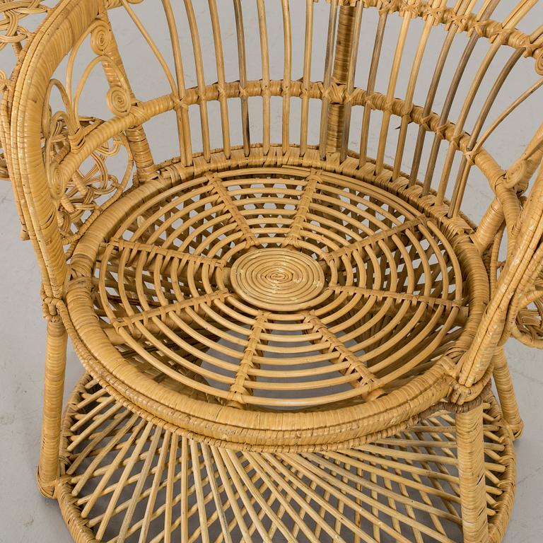 A 20th century wicker chair.