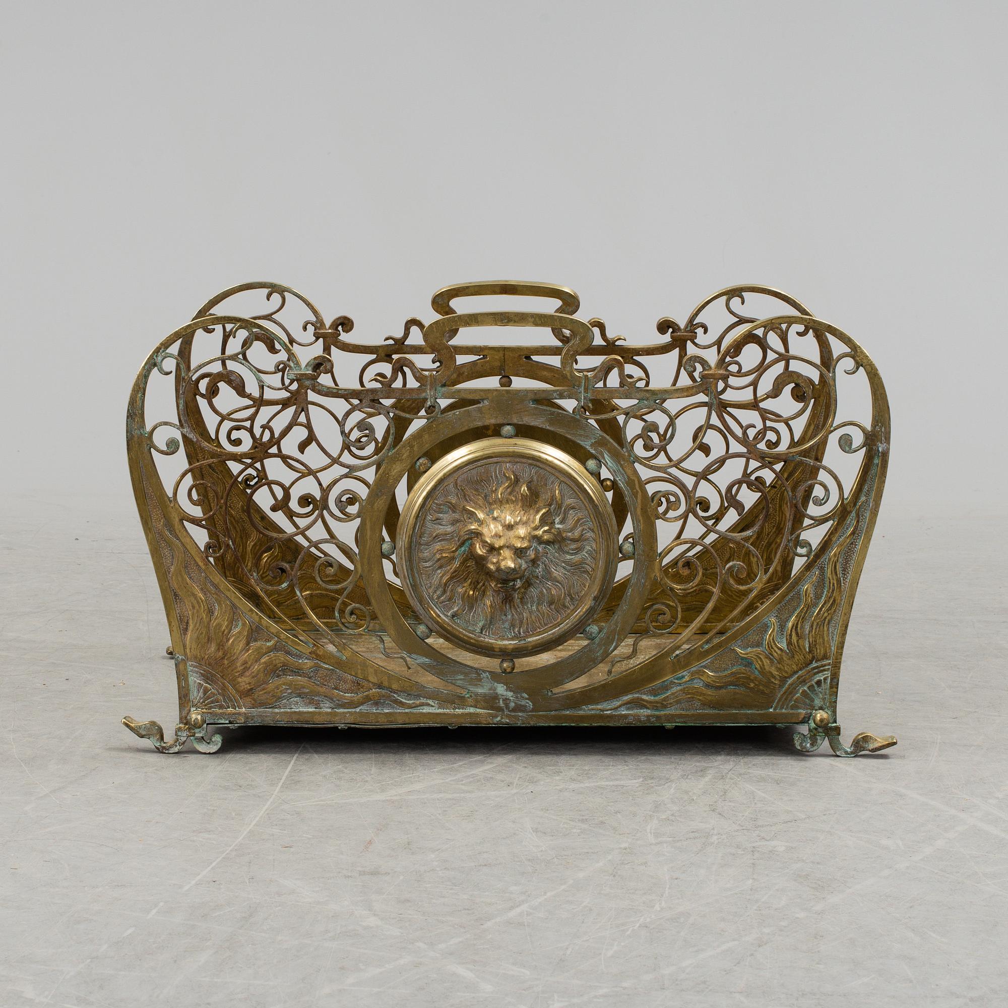 A French late 19th century brass firewood rack / fireplace log holder.