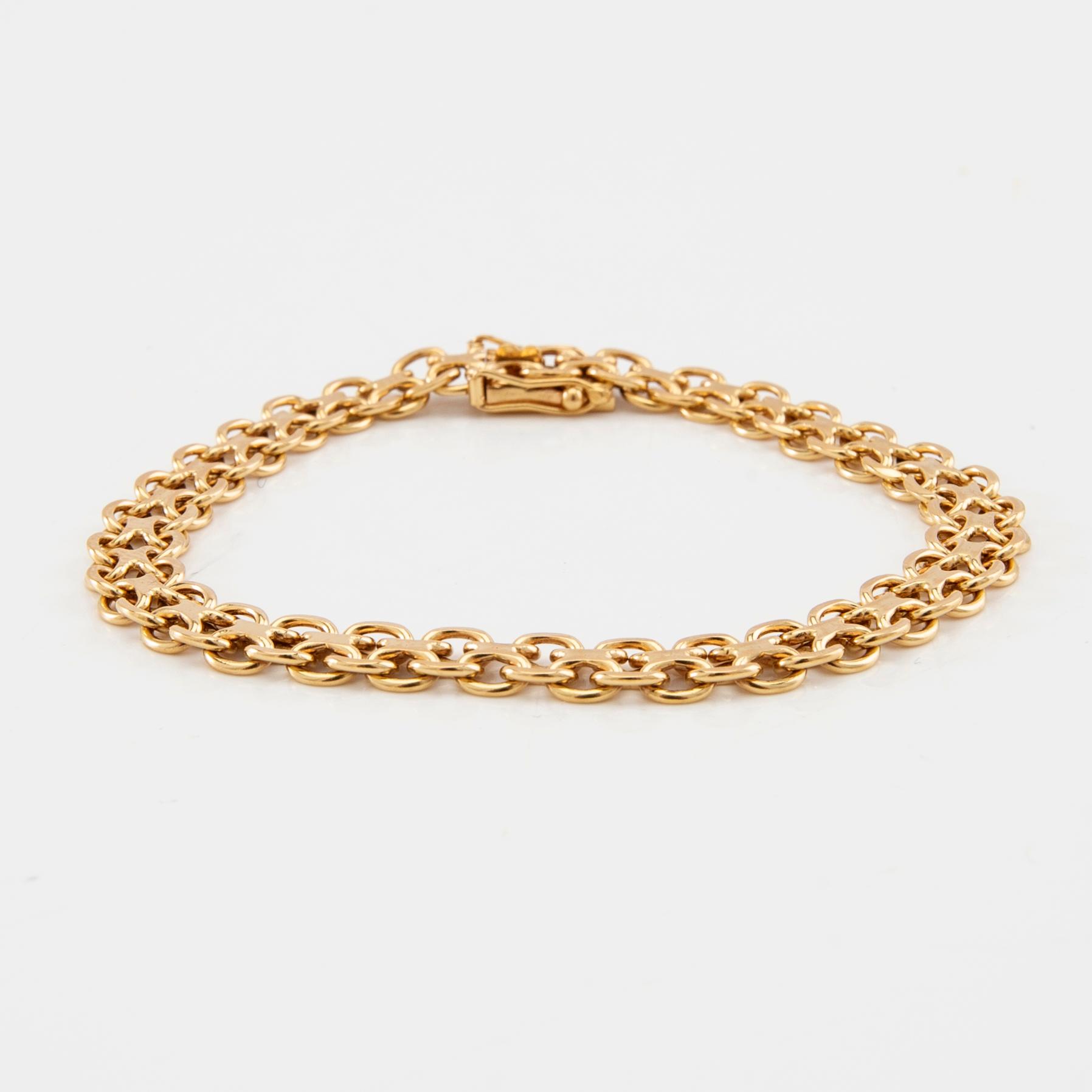 Bracelet X-link 18K gold.