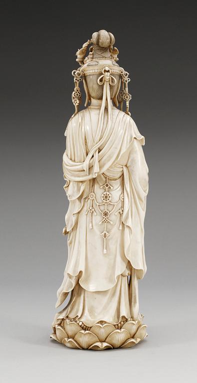 A Japanese ivory figure of Guanyin, probably Meiji period (1868-1912). Signed.