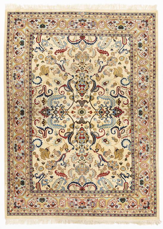 A carpet, signed, circa 286 x 212 cm.