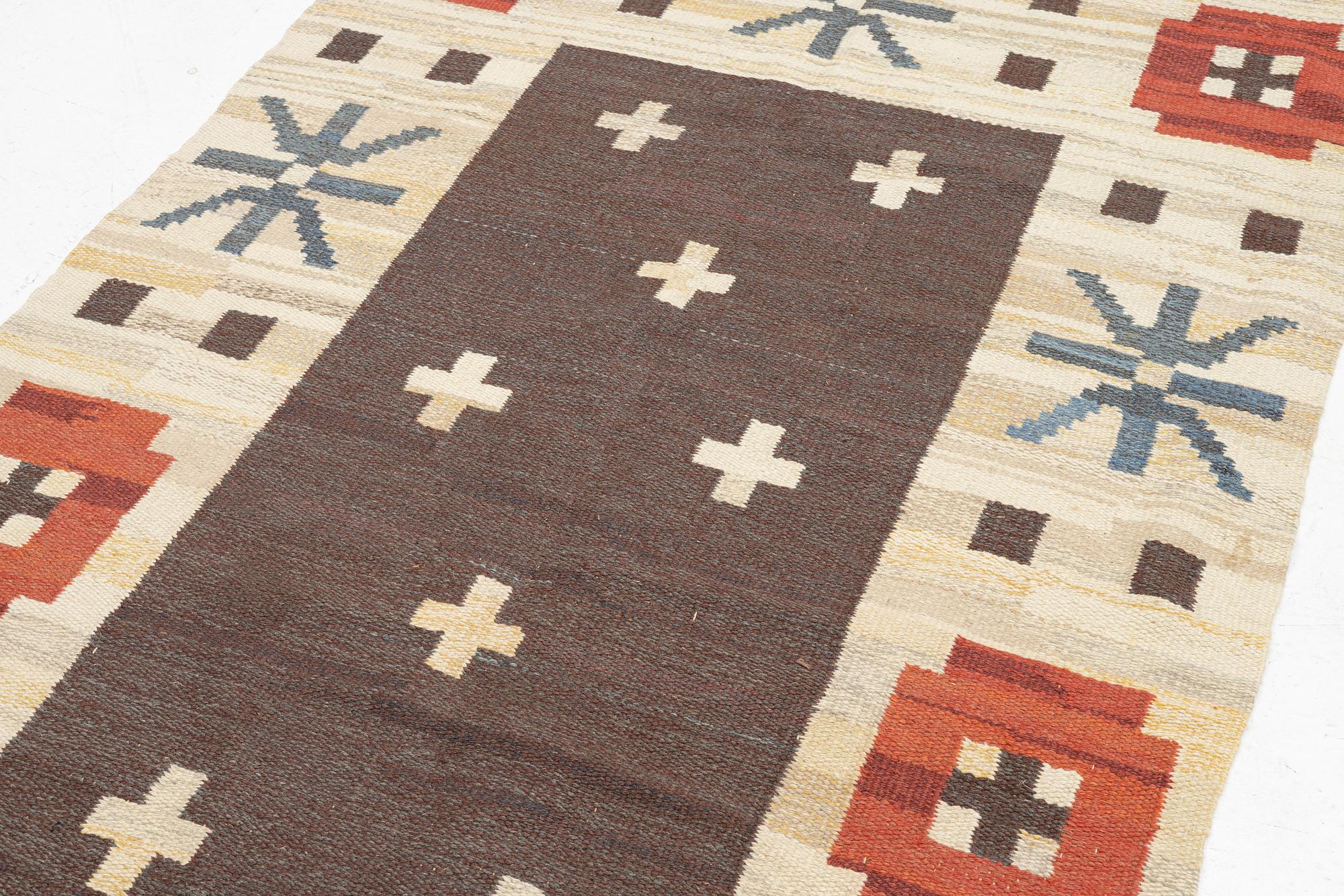 A Swedish flat weave carpet, c 287 x 142 cm.