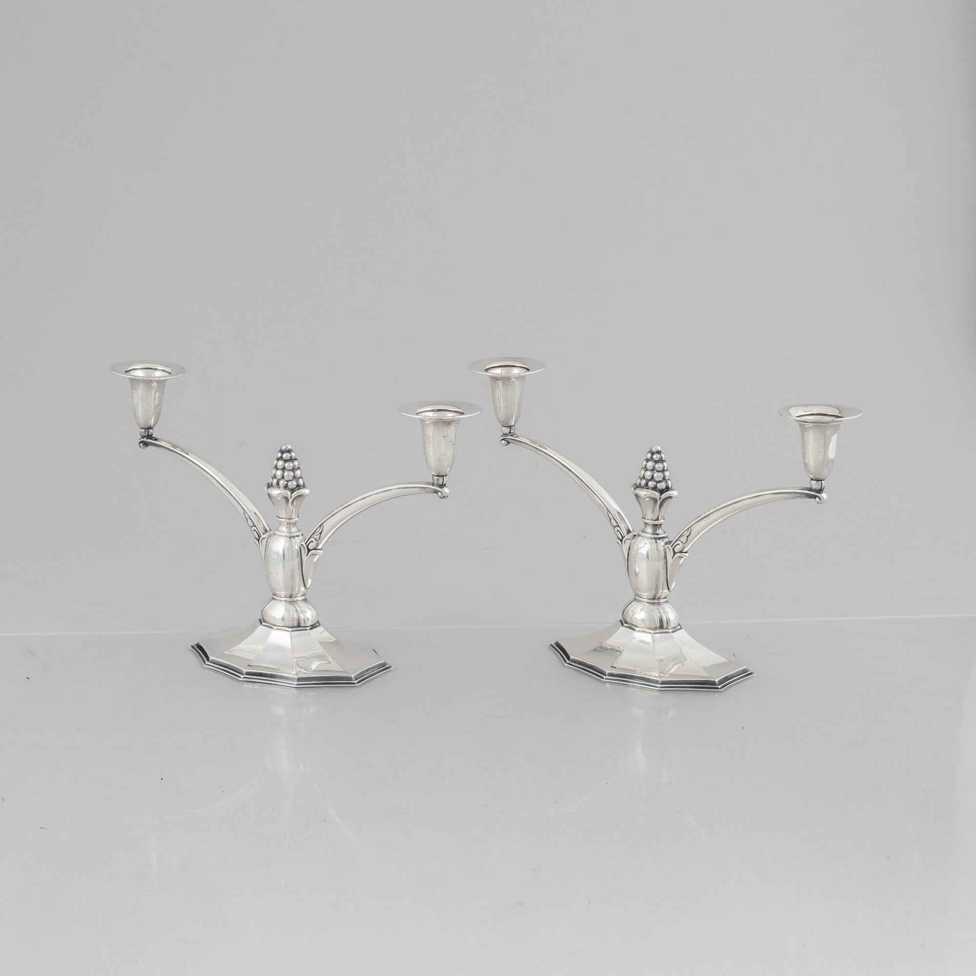 A pair of silver candelabra, Swedish import marks, probably 1920's/30's.